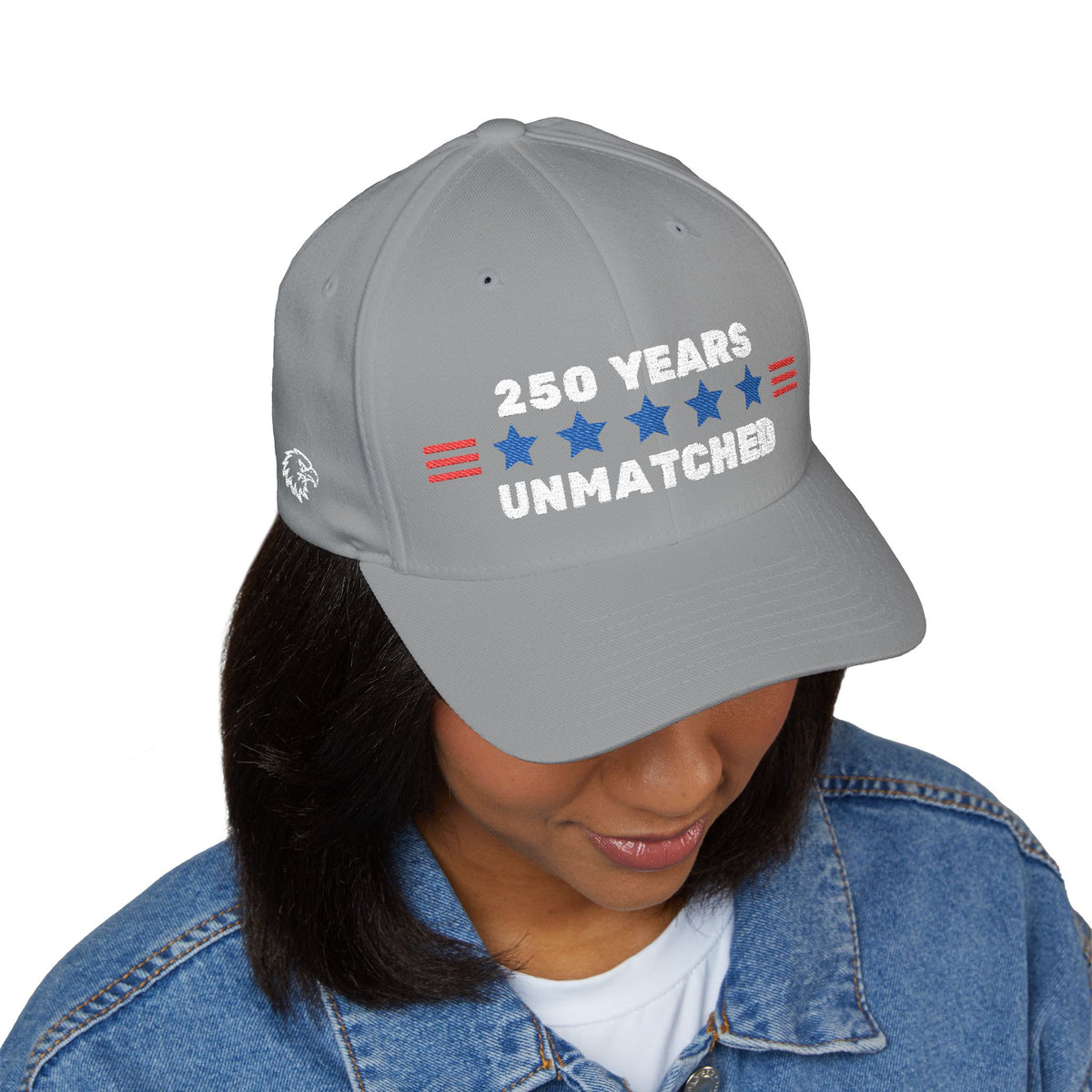 250 Years Unmatched Flexfit cap on model, outdoor setting