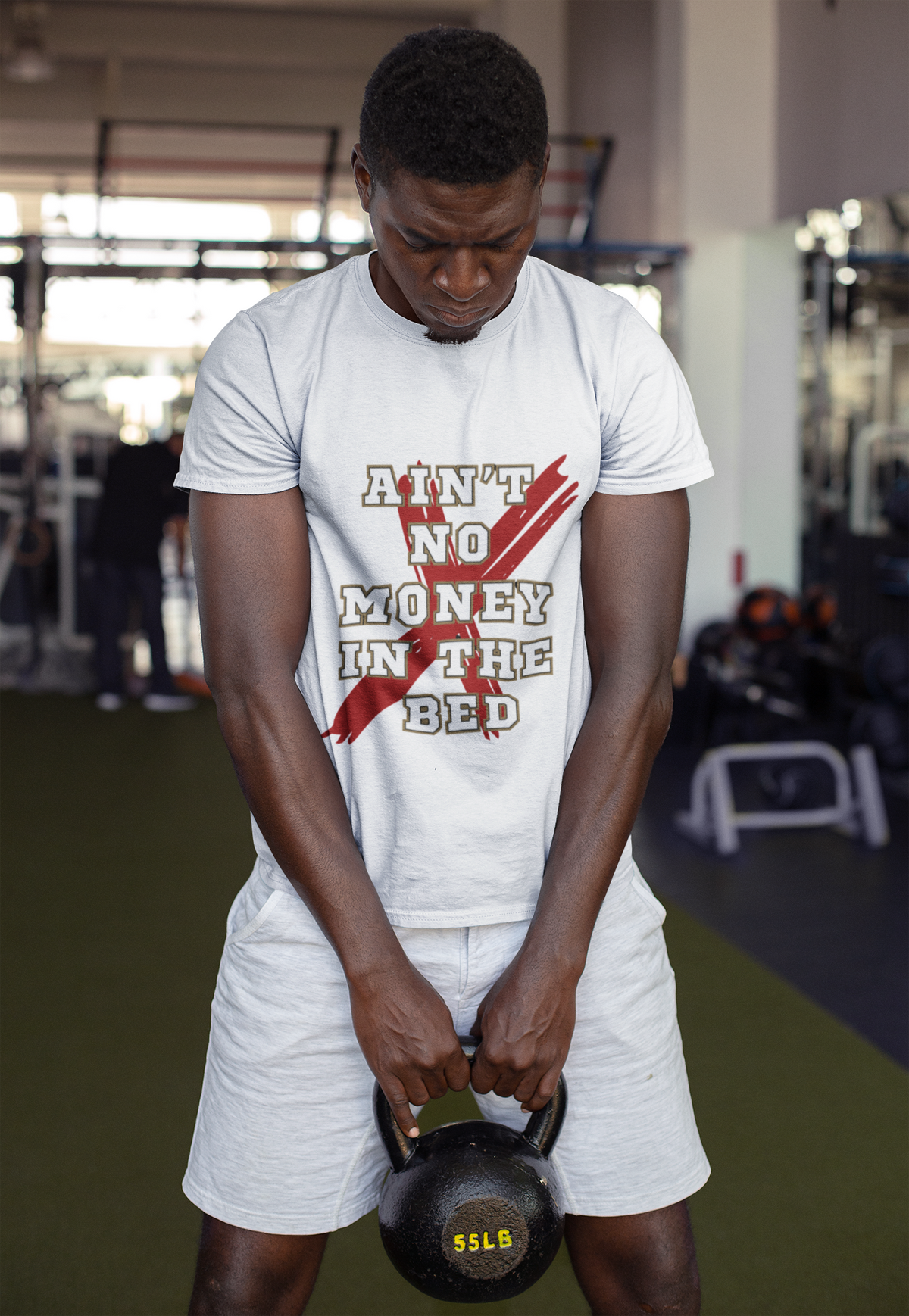 Model wearing the Ain't No Money in the Bed graphic t-shirt